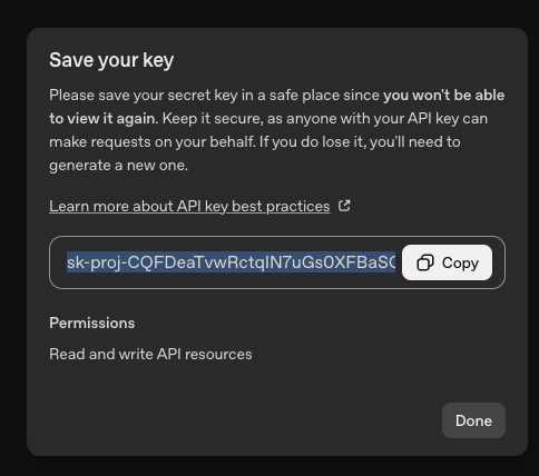 Save your key dialog showing a newly created OpenAI secret key with a Copy button